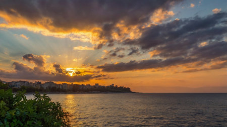 Sunset over the sea and the city of Palermo, Sicilyの写真素材