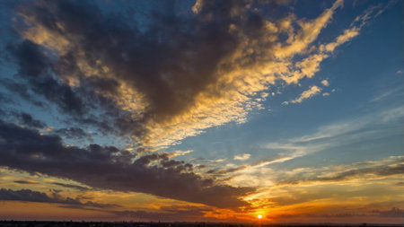 Dramatic sunset sky with clouds. Nature background. Sky with clouds at sunset.