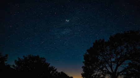 Beautiful night sky with stars and milky way. Long exposure photograph.の写真素材