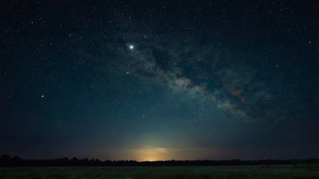 Night sky with stars and milky way. Long exposure photograph.