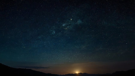Night sky with stars and milky way. Long exposure photograph.