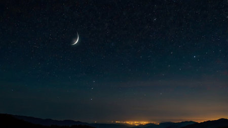 Night sky with stars and crescent moon in the night sky.の写真素材