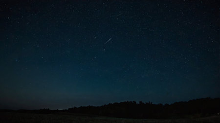 Night sky with stars and milky way. Long exposure photograph.