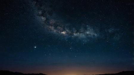 Night sky with stars and milky way. Long exposure photograph.
