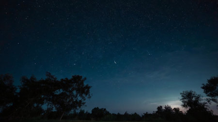 Night sky with stars and milky way. Long exposure photograph.の写真素材