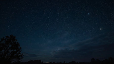 Night sky with stars and milky way. Long exposure photograph.の写真素材