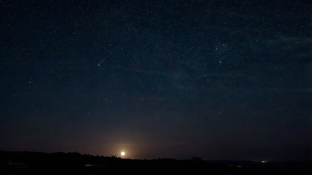 Night sky with stars and milky way in the summer. Long exposure photograph.の写真素材