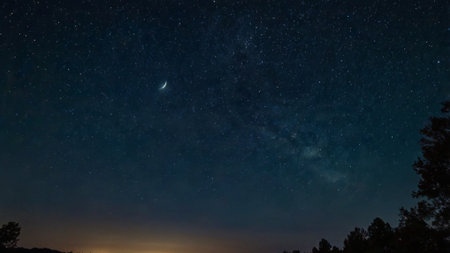 Night sky with stars and milky way. Long exposure photograph.