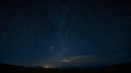 Milky way and stars in the night sky. Long exposure photograph.