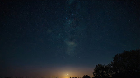 Night sky with stars and milky way. Long exposure photograph.