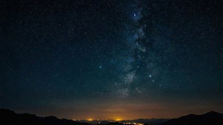 Milky way over the mountains at night. Long exposure photograph.