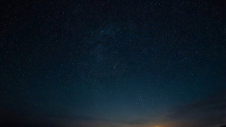 Night sky with stars and milky way. Long exposure photograph.の写真素材