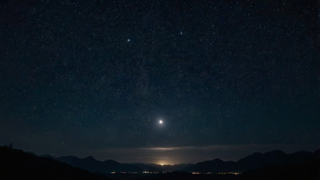 Night sky with stars and moon. Milky way over the mountains.