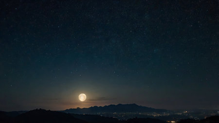 Night sky with full moon and stars. The starry sky over the mountains.の写真素材