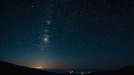 Night sky with stars and milky way, long exposure photograph.