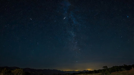 Milky way and stars in the night sky. Long exposure photograph.