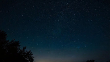 Night sky with stars and milky way. Long exposure photograph.の写真素材