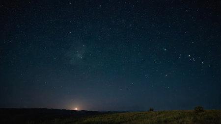 Night sky with stars and milky way. Long exposure photograph.
