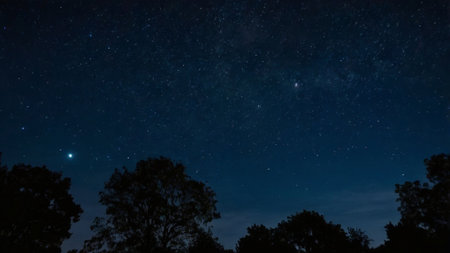 Night sky with stars and milky way. Long exposure photograph.