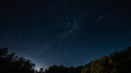 Night sky with stars and milky way. Long exposure photograph.