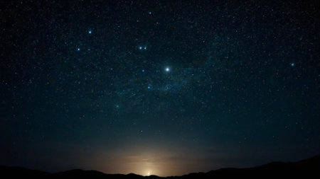Night sky with stars and milky way. Milky way over mountains.