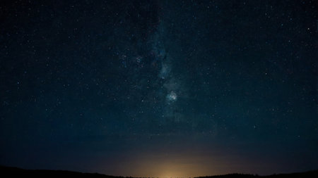 Milky way and stars in the night sky. Long exposure photograph.