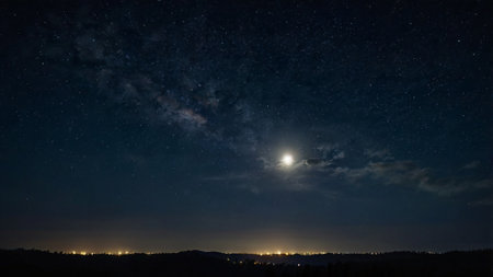 Night sky with stars and milky way. Panoramic view.