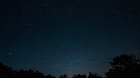 Night sky with stars and milky way. Long exposure photograph.