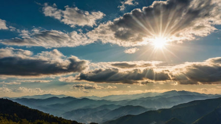Mountain landscape with sun and clouds. Panoramic view.の写真素材