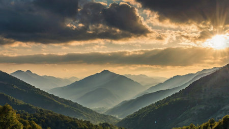 Mountain landscape in the rays of the setting sun. Landscape with mountains and forest.の写真素材