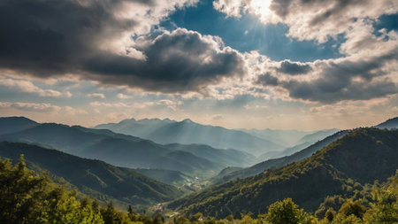 Mountain landscape with clouds and sunrays. Panorama of the mountains.