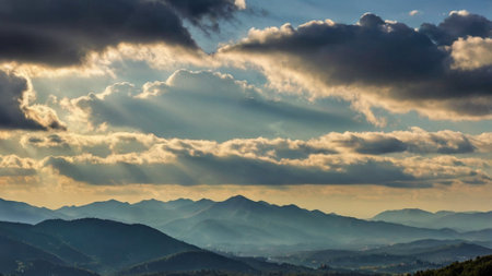 Mountain landscape with beautiful clouds at sunset. Carpathian, Ukraineの写真素材