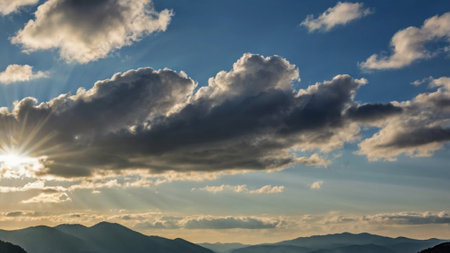 Beautiful sunset in the mountains. Dramatic sky with clouds.