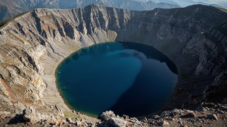Panoramic view of the Crater lake in the crater of the volcano.