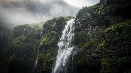 A vivid and immersive exploration of nature's most colorful and luminous landscapes, featuring golden alpine meadows bursting with wildflowers, turquoise volcanic crater lakes glowing under clear skies, vibrant coral reef bays seen from above, lush green river deltas winding through tropical wetlands, and breathtaking pastel sunrises melting across calm ocean horizons.