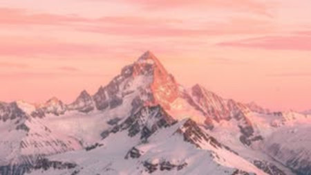 panoramic view of the snowy mountains in the morning at dawn