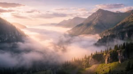 Beautiful panoramic view of foggy mountains in the morning
