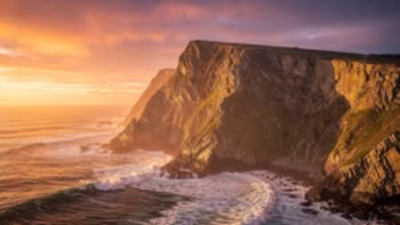 Panoramic view of the Atlantic Ocean coastline at sunset in Portugal