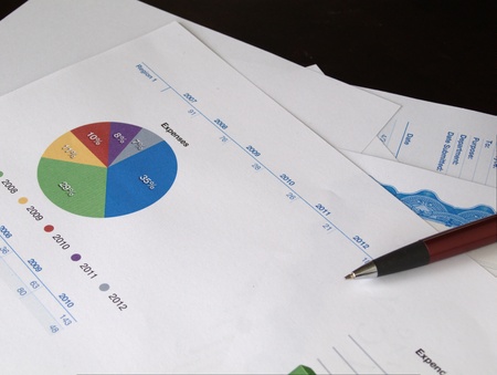 Pie Chart in a pile of documents  の写真素材