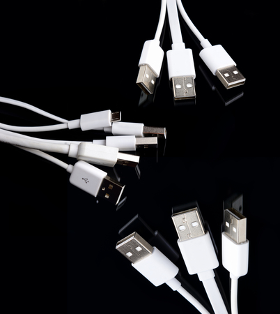 white usb cable on black background minimal pictureの写真素材
