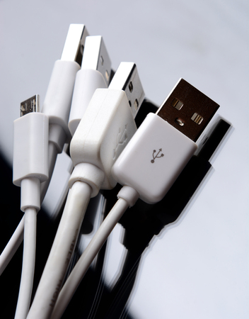 white usb cable on black background minimal picture
