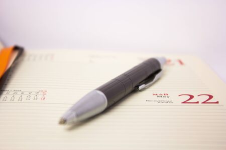 pen on the diaryの写真素材