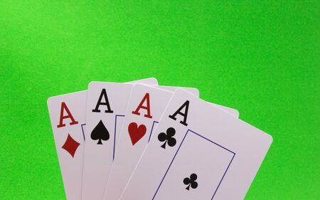 Four Aces on a Green Backgroundの写真素材