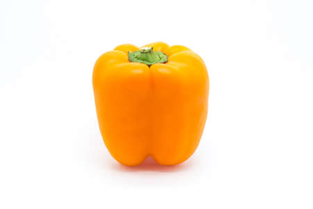 Orange pepper close up on a white backgroundの写真素材