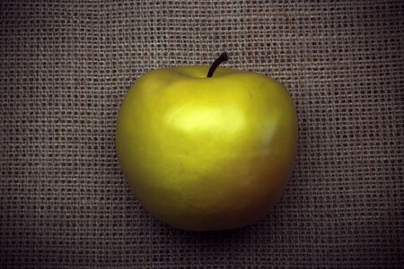 Apple on the background burlapの写真素材