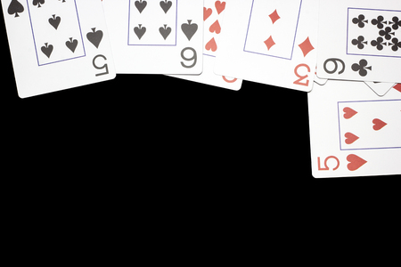 playing cards on a black background