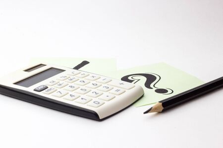 Close up of calculator, instrument of measurement and pencils