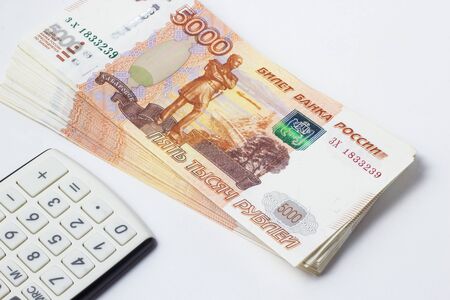 Lots of Money and a close-up calculatorの写真素材