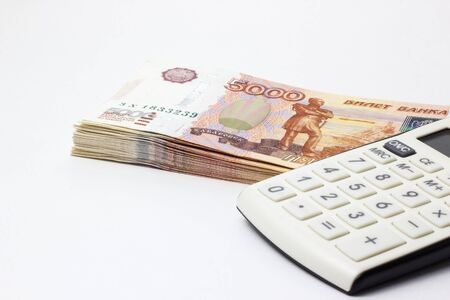 Lots of Money and a close-up calculatorの写真素材