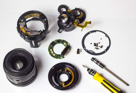 Disassembly and repair of a photo lens, cleaning the glass.の写真素材